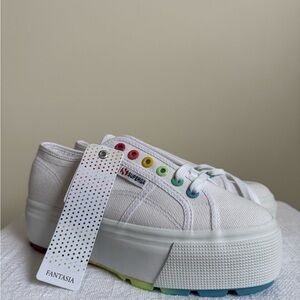 SUPERGA Women’s White Canvas Shoes with Rainbow Accents.